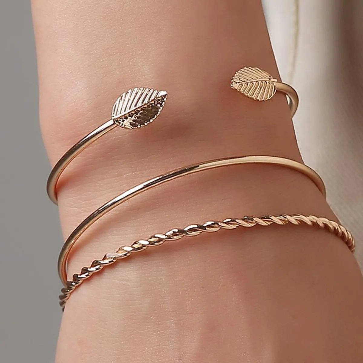 flower bangles for women-Fashion Twist Leaf Three-piece Geometric Open Bracelet Nhdp150014